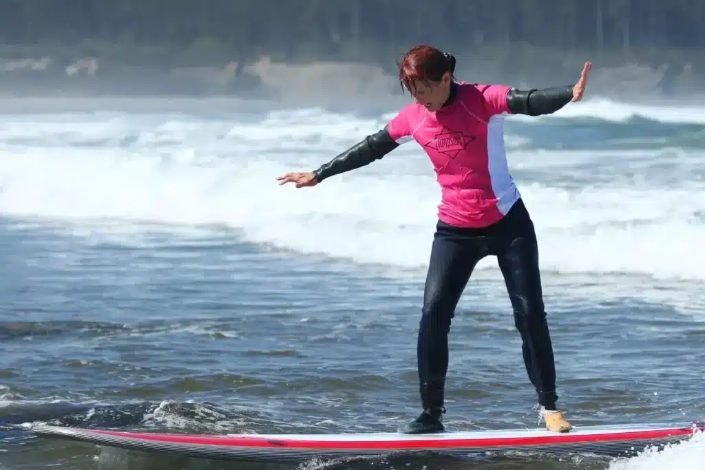 Paula Free having fun while adaptive surfing in California